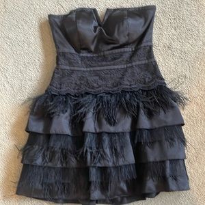 Custom made with lace and ostrich feather detail. From picture of Bebe dress